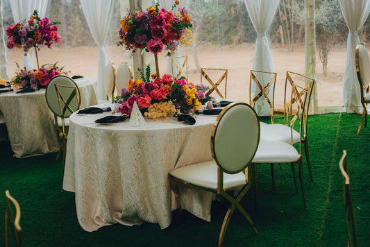 Elegant tables set with colorful floral arrangements for an event