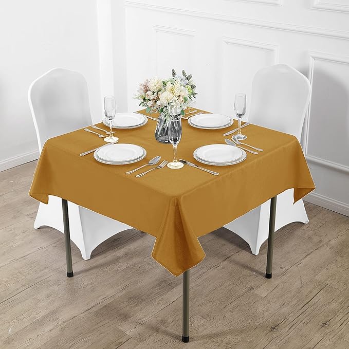 Fokitut 2 Pack Waterproof Square Tablecloth, 70x70 Inch, Stain Resistant and Wrinkle Polyester Table Cloth, Fabric Table Cover for Kitchen Dining, Wedding, Party, Holiday Dinner-Gold